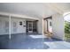 Attached carport area featuring access to storage and screened in entry at 6205 Green View Dr # 129, Sarasota, FL 34231