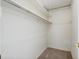 Walk-in closet with shelving and carpeted flooring at 6205 Green View Dr # 129, Sarasota, FL 34231