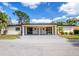 Charming single-story duplex with a spacious driveway and well-maintained landscaping at 6205 Green View Dr # 129, Sarasota, FL 34231