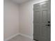 Mud room with gray door and neutral walls at 6705 20Th W Ave, Bradenton, FL 34209