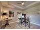 Office area offers ample workspace, natural light, and neutral color palette at 7760 Grande Shores Dr, Sarasota, FL 34240
