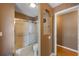 Bathroom featuring a shower and toilet area with access to another room at 1209 89Th Nw St, Bradenton, FL 34209