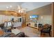 Open-concept living space showcasing the kitchen with a large island and the cozy living room at 1209 89Th Nw St, Bradenton, FL 34209