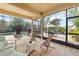 Spacious screened porch with comfortable seating, providing an ideal outdoor living and entertaining space at 12810 Daisy Pl, Bradenton, FL 34212
