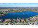 Stunning aerial view of lakefront property with beautiful water views and manicured landscapes at 14733 Como Cir, Lakewood Ranch, FL 34202