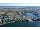 Aerial view of lakefront properties showcasing serene water views and lush green landscapes at 14733 Como Cir, Lakewood Ranch, FL 34202