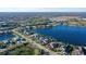 Aerial view of lakefront homes with beautiful water views and well-manicured landscaping at 14733 Como Cir, Lakewood Ranch, FL 34202