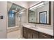The primary bathroom boasts a large shower, white marble countertops, and modern fixtures at 14733 Como Cir, Lakewood Ranch, FL 34202