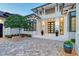 Elegant entrance boasting a grand entrance, well manicured bushes, and brick driveway at 14733 Como Cir, Lakewood Ranch, FL 34202