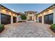 Lovely house showcasing a beautifully brick driveway and multi-car garage at 14733 Como Cir, Lakewood Ranch, FL 34202