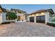 Gorgeous home featuring a well manicured lawn, large driveway and multi-car garage at 14733 Como Cir, Lakewood Ranch, FL 34202
