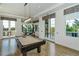 Recreational space featuring a billiards table, and large windows with scenic views at 14733 Como Cir, Lakewood Ranch, FL 34202