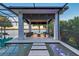 Inviting waterfront outdoor living space with comfortable seating and stylish design elements at 14733 Como Cir, Lakewood Ranch, FL 34202