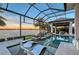 Tranquil pool area with modern lounge chairs and stunning waterfront views, perfect for unwinding at 14733 Como Cir, Lakewood Ranch, FL 34202