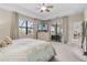 Spacious main bedroom with a tray ceiling, large windows, and access to the lanai at 15607 White Linen Dr, Lakewood Ranch, FL 34211