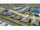 This aerial view shows the community with ponds and green spaces, as well as sidewalks and neighborhood streets at 1901 Everson St, Bradenton, FL 34208