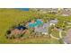 Aerial view showcasing the community pool, clubhouse, and surrounding greenery at 1901 Everson St, Bradenton, FL 34208