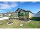 Charming front exterior with a well-landscaped yard and inviting curb appeal at 1901 Everson St, Bradenton, FL 34208