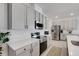 Sleek kitchen with stainless steel appliances, modern cabinetry, and quartz countertops at 1901 Everson St, Bradenton, FL 34208