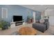 Comfortable living room with modern fireplace, stylish furnishings, and an eye-catching aquarium at 1901 Everson St, Bradenton, FL 34208
