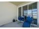 Comfortable covered patio with sliding glass doors and relaxing seating area at 1901 Everson St, Bradenton, FL 34208