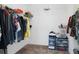 A well-organized walk-in closet offers ample storage with hanging rods and shelving units at 1901 Everson St, Bradenton, FL 34208
