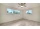 Bedroom features two large windows and tile floor at 3085 Goldenrod St, Sarasota, FL 34239