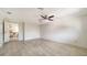 Bright bedroom featuring wood-look tile flooring and access to the living area at 3085 Goldenrod St, Sarasota, FL 34239