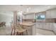 Modern kitchen featuring granite countertops, stainless steel appliances, and a functional island at 3085 Goldenrod St, Sarasota, FL 34239