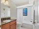 Bathroom complete with granite countertop and shower/tub combo at 3629 Longmeadow # 38, Sarasota, FL 34235