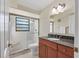 Bathroom features a shower and granite countertop at 3629 Longmeadow # 38, Sarasota, FL 34235