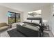 Staged main bedroom has a view of the exterior at 3629 Longmeadow # 38, Sarasota, FL 34235