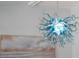 Close-up of an artistic glass chandelier at 400 Dona Dr, Nokomis, FL 34275
