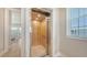 Interior elevator showcasing wooden paneling and stainless steel trim, offering convenient access to different levels of the home at 4207 Marina View Way, Cortez, FL 34215