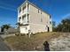 Stunning three-story home with a two-car garage and multiple balconies at 4207 Marina View Way, Cortez, FL 34215