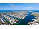 Stunning aerial view of a waterfront property boasting lush landscaping and direct water access at 542 67Th St, Holmes Beach, FL 34217