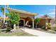 Inviting home entrance featuring an arched entryway, well-maintained walkway, and lush greenery at 542 67Th St, Holmes Beach, FL 34217