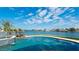 Gorgeous water view from the pool and spa area on a sunny day at 542 67Th St, Holmes Beach, FL 34217