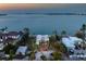 Beautiful waterfront property with stunning views and lush landscaping at 679 Norsota Way, Sarasota, FL 34242