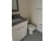 Well-maintained bathroom with granite vanity and toilet on top of a tile floor that blends cleanliness with a modern design at 7211 W Country Club N Dr # 135, Sarasota, FL 34243