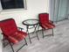Charming outdoor patio featuring comfortable seating with a table, perfect for enjoying the fresh air at 7211 W Country Club N Dr # 135, Sarasota, FL 34243