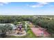 Beautiful community recreation area featuring a playground, basketball court, tennis court, and swimming pool at 833 Honeyflower Loop, Bradenton, FL 34212