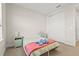 Bedroom with a closet, small desk, and a kid-friendly decor at 8609 Evening Dr, Sarasota, FL 34241