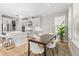 Open-concept dining space with natural light, modern furnishings, and an inviting atmosphere at 8609 Evening Dr, Sarasota, FL 34241
