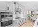 Well-equipped kitchen with modern appliances, sleek countertops, and ample cabinet space at 8609 Evening Dr, Sarasota, FL 34241