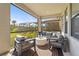 Cozy screened patio with stylish furniture and outdoor living space at 8609 Evening Dr, Sarasota, FL 34241