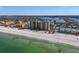 Stunning aerial view of beachfront condos and ocean, offering luxurious coastal living with amazing waterfront access at 900 Gulf Blvd # 805, Indian Rocks Beach, FL 33785