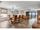 Spacious dining area with ample seating, seamlessly connected to the living area and ocean views at 900 Gulf Blvd # 805, Indian Rocks Beach, FL 33785