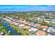 Waterfront neighborhood with beautiful landscaping, private docks, and swimming pools near lush greenery and ocean views at 104 Inlets Blvd # 104, Nokomis, FL 34275