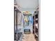Organized walk-in closet with shelving, hanging rods, and ample storage for clothing and accessories at 104 Inlets Blvd # 104, Nokomis, FL 34275